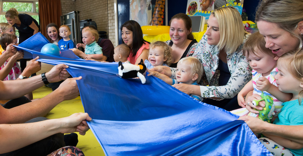 Cheering the penguins down the slide!